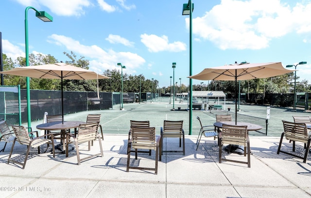 2264 Lookout Lndg, Fleming Island, FL 32003 - view of home's community with a tennis court and fence