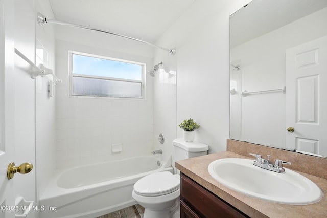 bathroom with toilet, washtub / shower combination, and vanity