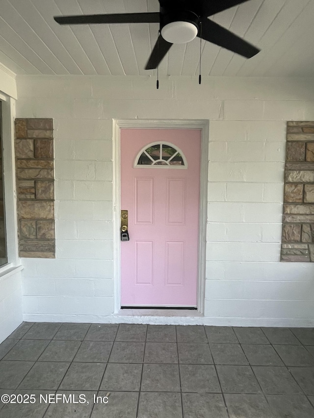3128 Phyllis St, Jacksonville, FL 32205 - entrance to property featuring ceiling fan and concrete block siding