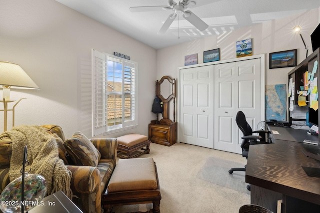 office featuring a ceiling fan and carpet floors