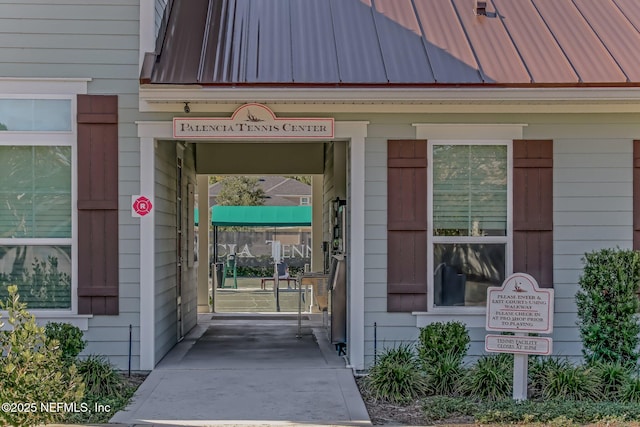 property entrance with a standing seam roof and metal roof