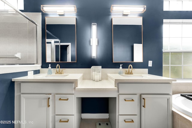1071 Green Pine Cir, Orange Park, FL 32065 - full bath with double vanity, a bath, a tile shower, and plenty of natural light