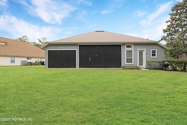 1071 Green Pine Cir, Orange Park, FL 32065 - rear view of property with a sunroom, a lawn, and stucco siding