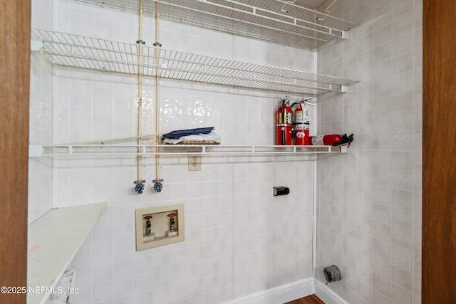 laundry room with hookup for a washing machine and laundry area