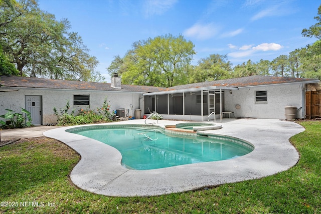 view of swimming pool with a pool with connected hot tub, central AC unit, a patio, and a sunroom