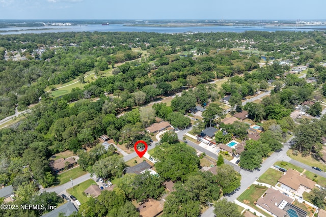 drone / aerial view with a residential view and a water view
