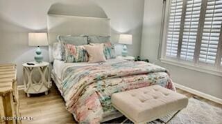 1415 1st St N Unit 302, Jacksonville Beach, FL 32250 - bedroom featuring wood finished floors and baseboards