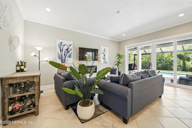 living area featuring recessed lighting, ornamental molding, and light tile patterned floors