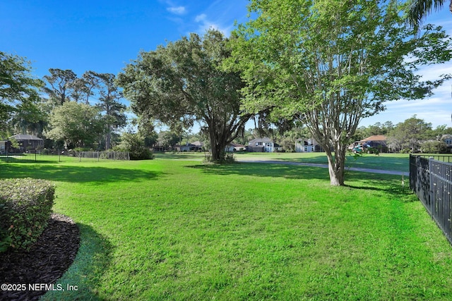 view of yard with fence