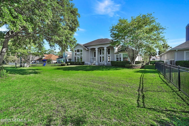 view of yard with fence