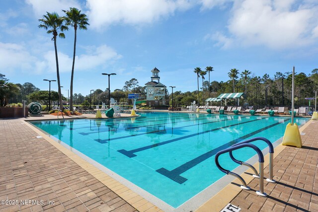 pool with a patio area