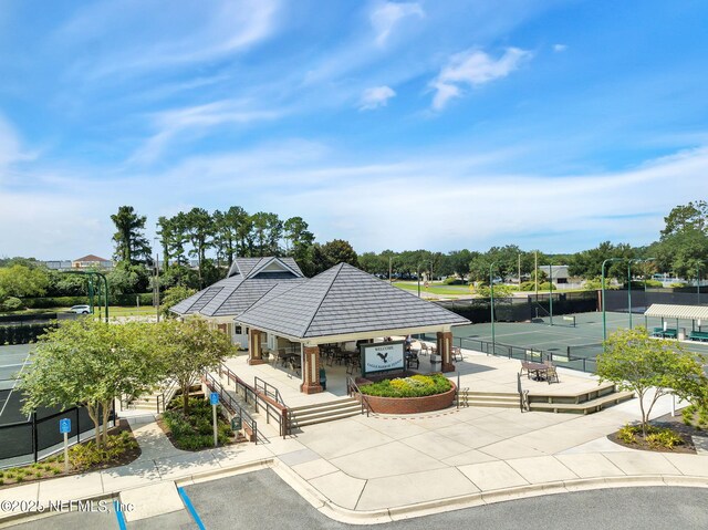 view of property with fence