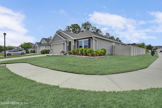 view of side of home featuring a lawn, a garage, fence, and driveway