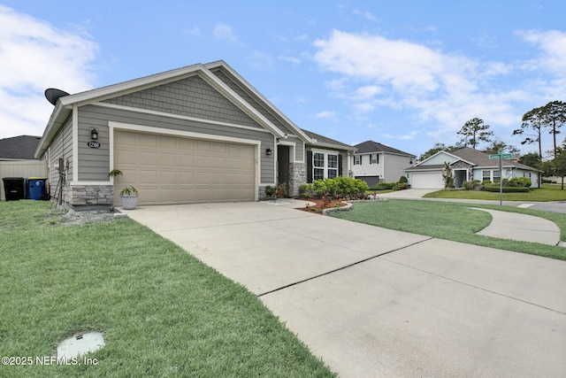 view of front of home featuring an attached garage, concrete driveway, a front lawn, and stone siding
