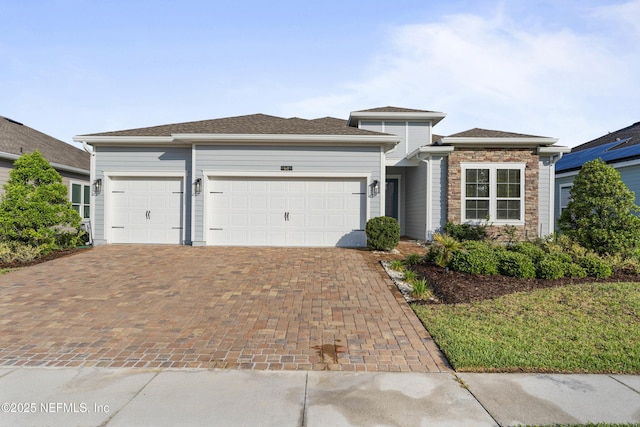 64 Nevis Peak Ln, Saint Augustine, FL 32092 - view of front of property with a garage and decorative driveway