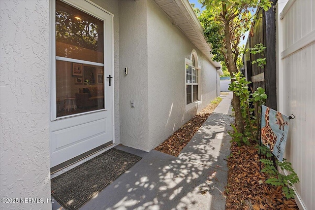 2681 Kimberly Forest Dr E, Jacksonville, FL 32246 - doorway to property with stucco siding