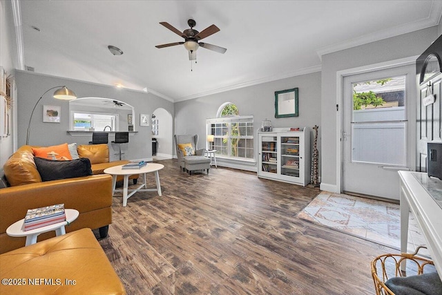 2681 Kimberly Forest Dr E, Jacksonville, FL 32246 - living area featuring ceiling fan, plenty of natural light, arched walkways, wood finished floors, and crown molding