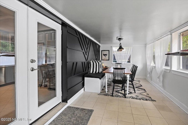 2681 Kimberly Forest Dr E, Jacksonville, FL 32246 - dining room featuring light tile patterned floors and baseboards