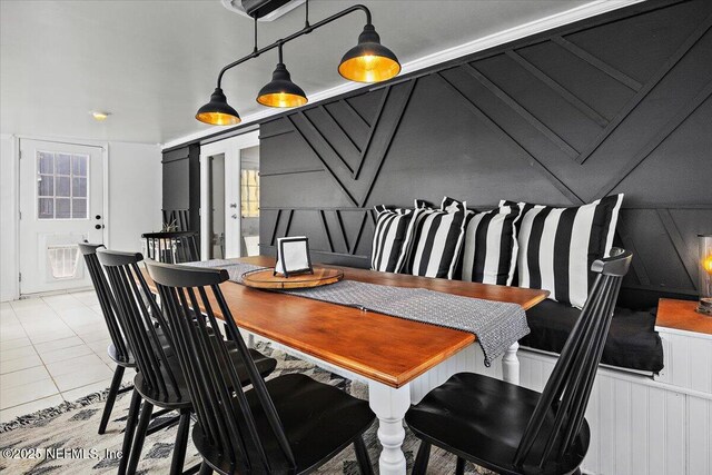2681 Kimberly Forest Dr E, Jacksonville, FL 32246 - dining space with a decorative wall and tile patterned floors