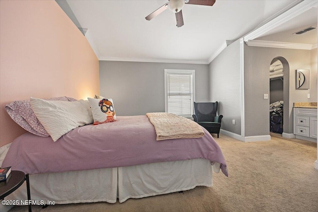 2681 Kimberly Forest Dr E, Jacksonville, FL 32246 - bedroom featuring ornamental molding, arched walkways, light colored carpet, baseboards, and a ceiling fan