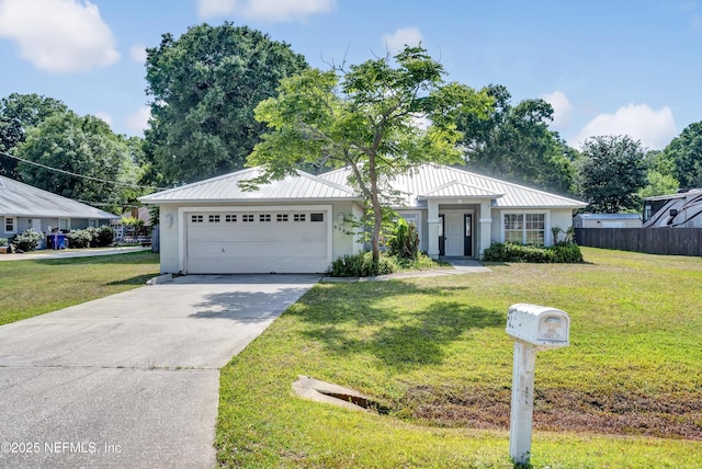 5329 Ogilvie Ln, Saint Augustine, FL 32086 - ranch-style home featuring a garage, stucco siding, concrete driveway, and a front yard