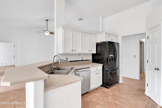 5329 Ogilvie Ln, Saint Augustine, FL 32086 - kitchen featuring stainless steel dishwasher, black fridge with ice dispenser, a sink, light tile patterned floors, and a peninsula