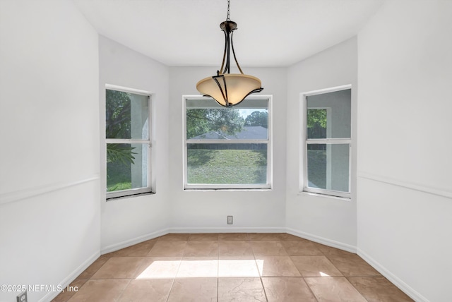 5329 Ogilvie Ln, Saint Augustine, FL 32086 - unfurnished dining area featuring baseboards
