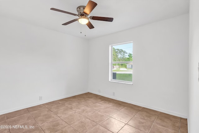 5329 Ogilvie Ln, Saint Augustine, FL 32086 - unfurnished room with light tile patterned floors, baseboards, and a ceiling fan