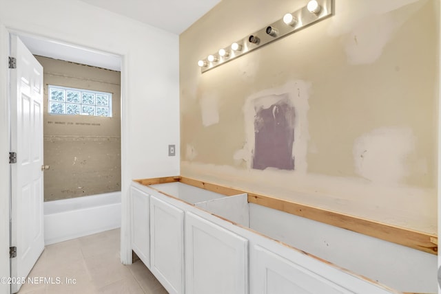 5329 Ogilvie Ln, Saint Augustine, FL 32086 - full bath with tile patterned floors and a tub