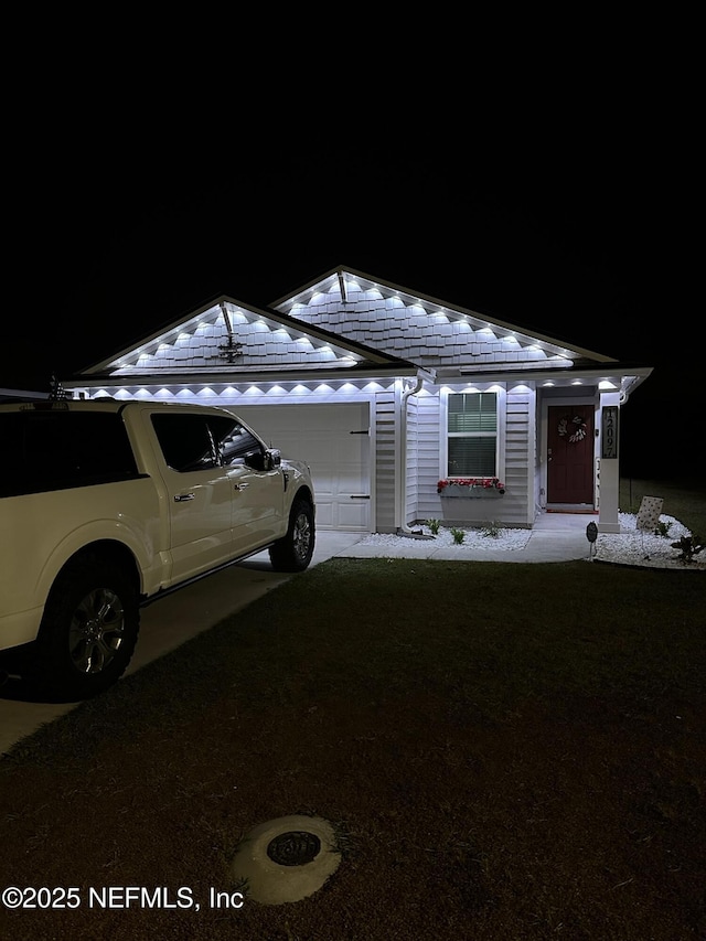 view of front of property featuring an attached garage