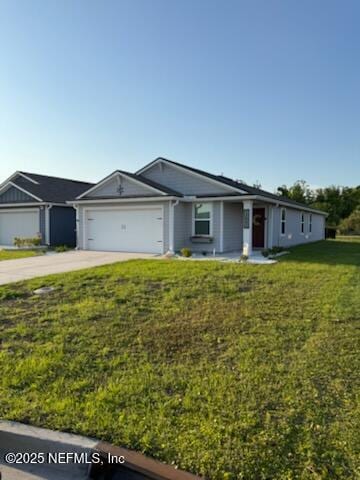 ranch-style home with a front yard, concrete driveway, and an attached garage