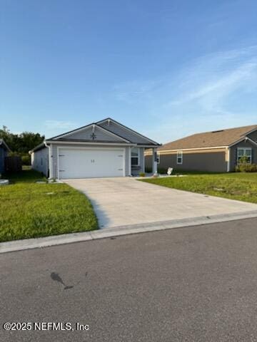 ranch-style home with concrete driveway, an attached garage, and a front lawn