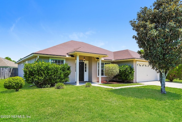ranch-style home featuring a front lawn, stucco siding, concrete driveway, and an attached garage