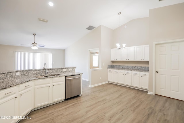 kitchen featuring a sink, visible vents, dishwasher, ceiling fan with notable chandelier, and hanging light fixtures