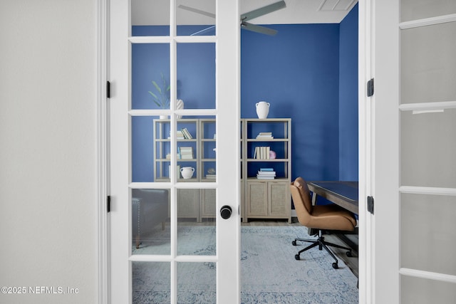 home office with french doors and wood finished floors