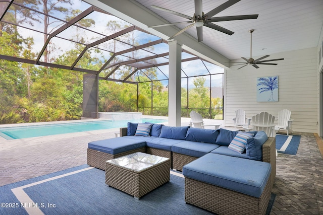 view of patio / terrace featuring glass enclosure, ceiling fan, an outdoor pool, and an outdoor hangout area