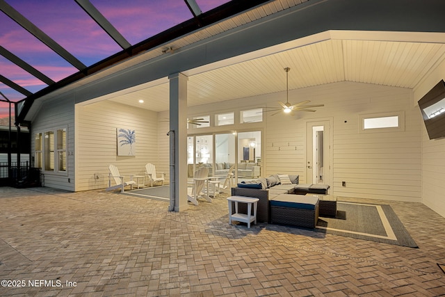 view of patio featuring ceiling fan, a lanai, and an outdoor hangout area