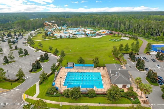 bird's eye view featuring a forest view