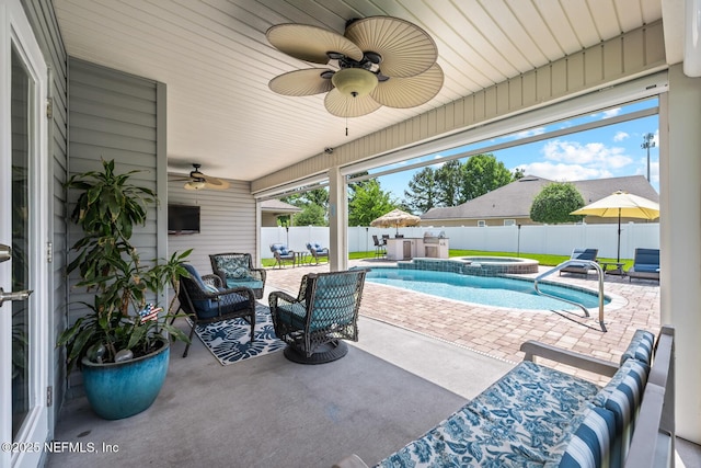 view of pool featuring a patio, a fenced backyard, ceiling fan, and an outdoor hangout area