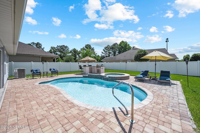 view of swimming pool featuring central air condition unit, a fenced backyard, a pool with connected hot tub, and a patio area