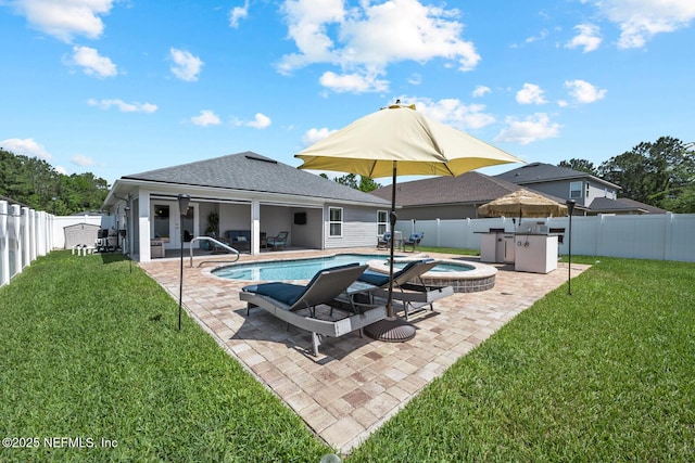 view of swimming pool featuring a fenced in pool, a fenced backyard, an in ground hot tub, and a yard