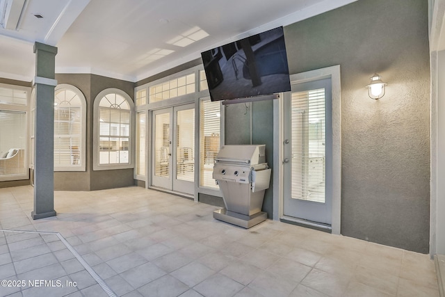 interior space featuring a patio area and french doors
