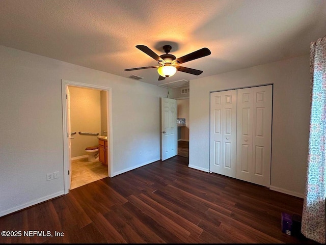 170 Spruce Rd, Ocala, FL 34472 - unfurnished bedroom with dark wood-style floors, a closet, visible vents, and baseboards