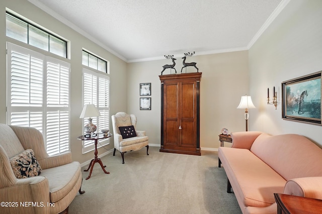 living area with baseboards, ornamental molding, a textured ceiling, and light colored carpet