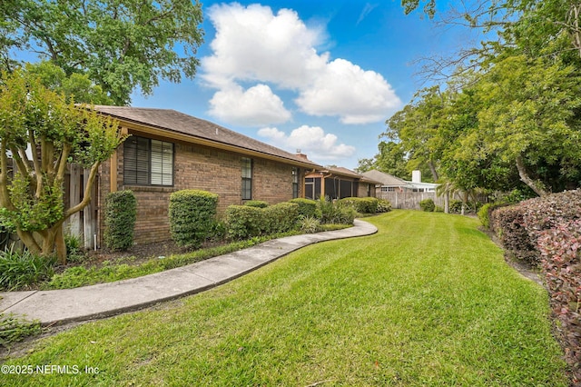 view of yard with fence