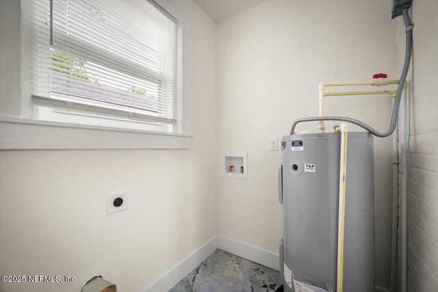 6422 Kathryn Dr, Jacksonville, FL 32208 - laundry room with water heater, baseboards, hookup for a washing machine, marble look tiles, and hookup for an electric dryer