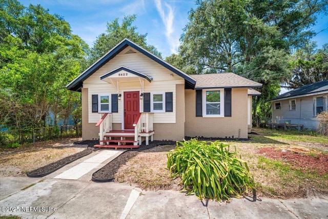 6422 Kathryn Dr, Jacksonville, FL 32208 - bungalow with brick siding and fence
