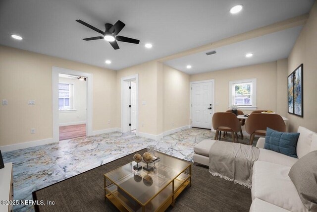 6422 Kathryn Dr, Jacksonville, FL 32208 - carpeted living room with ceiling fan, recessed lighting, and baseboards