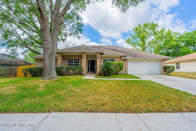 1218 Shallowford Dr E, Jacksonville, FL 32225 - ranch-style house with a garage, driveway, and brick siding