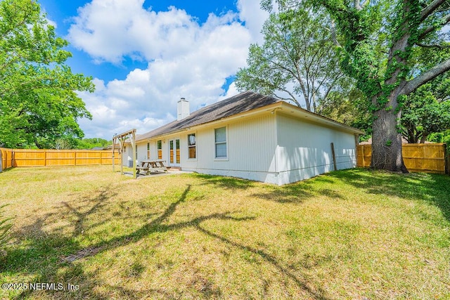 1218 Shallowford Dr E, Jacksonville, FL 32225 - back of house featuring a chimney